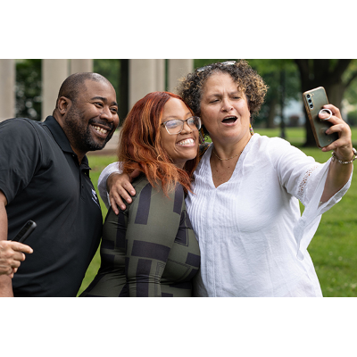 Festival goers enjoy a selfie together