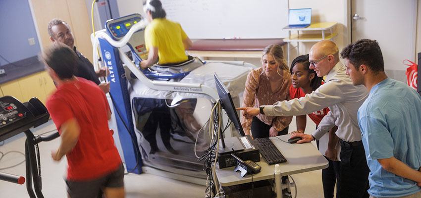 Students work with faculty in Exercise Physiology Lab in the Professional Studies building.