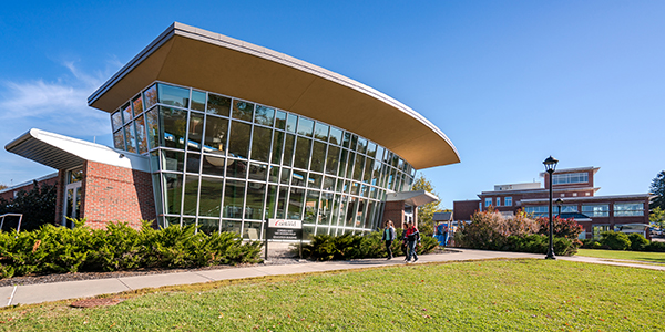 Outside of VanHoesen Hall and Education Building in the fall