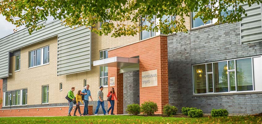 Graduate students entering the Professional Studies Building