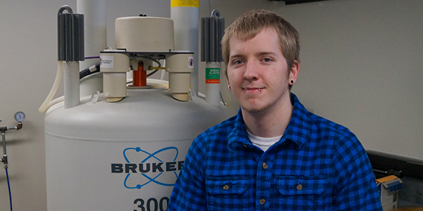 Chemistry alumni Potter in his workplace