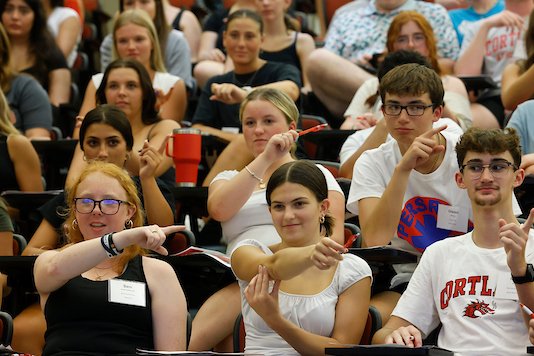 Incoming first-year SUNY Cortland students attend their first lecture by Psychology associate professor Kaitlin Flannery