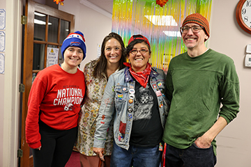 SUNY Cortland's Katarina Silvestri, associate professor of literacy, Casey Pennington, Associate professor of literacy, Casey Pennington, assistant professor of literacy, Amanda X, automation programmer analyst, and Casey Hickey, technology accessibility coordinator, volunteer for the Crown Table Feast.
