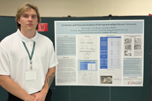 Student presenting polymer research.
