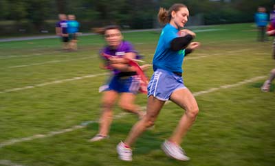 Students engaged in an intramural game